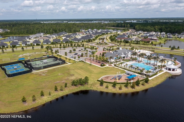 bird's eye view featuring a water view and a residential view