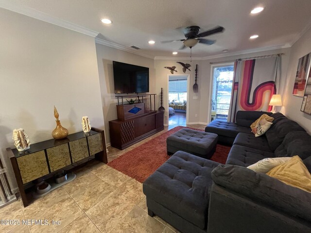 living room featuring a ceiling fan, recessed lighting, visible vents, and crown molding