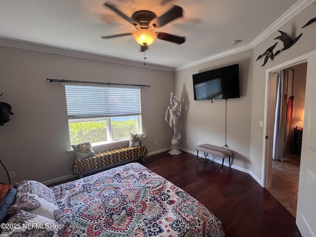 bedroom with baseboards, wood finished floors, a ceiling fan, and crown molding