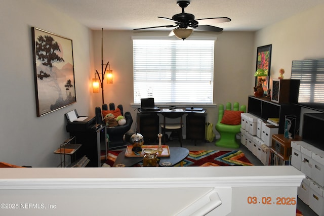 interior space featuring ceiling fan