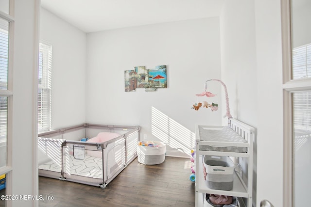 bedroom featuring dark wood-type flooring