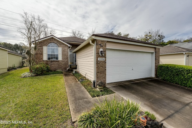 ranch-style home with a garage, brick siding, and a front lawn