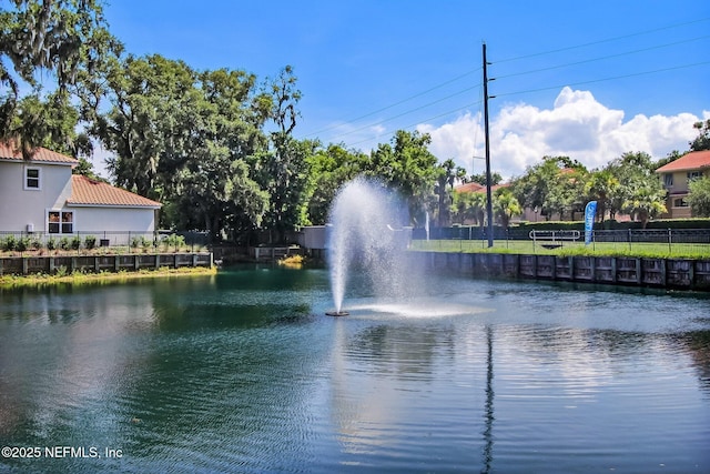 water view featuring fence