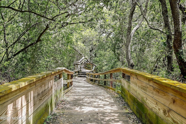 surrounding community with a forest view