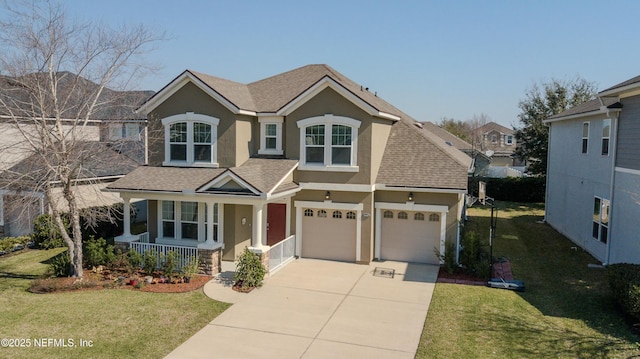 view of front facade with driveway, a shingled roof, stucco siding, a porch, and a front yard