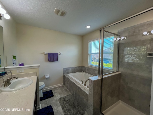 full bath featuring a stall shower, toilet, a textured ceiling, vanity, and a bath