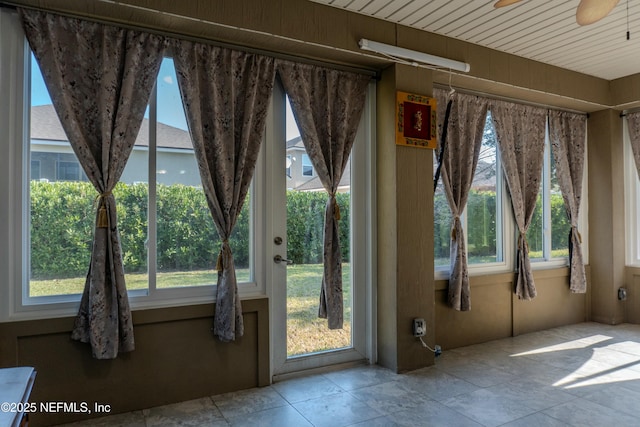 entryway with a ceiling fan