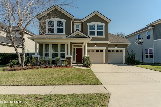 view of front facade featuring covered porch, driveway, a front lawn, and stucco siding