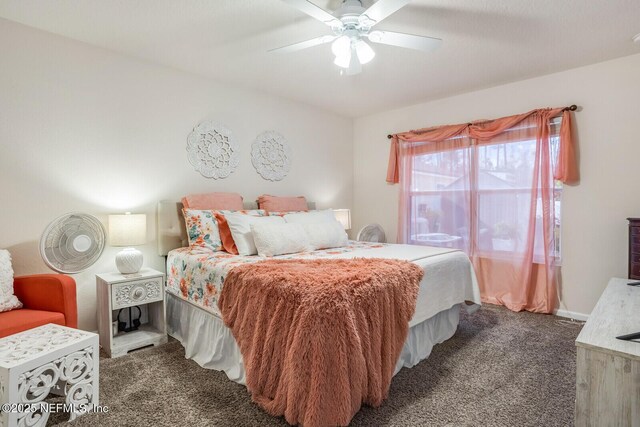 95170 Timberlake Dr, Fernandina Beach, FL 32034 - bedroom with a ceiling fan and dark colored carpet