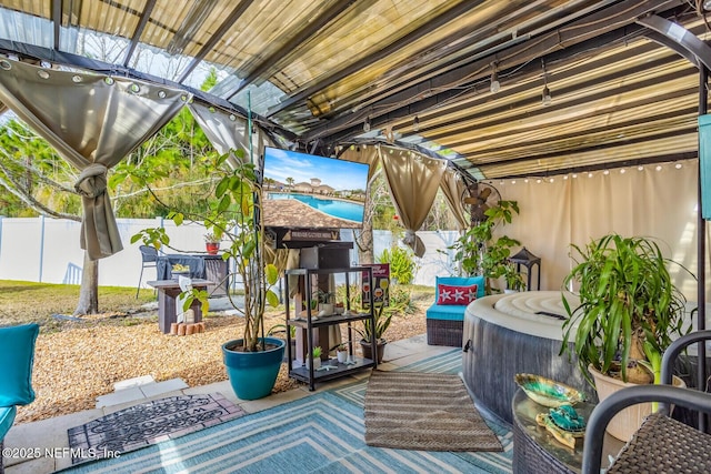 95170 Timberlake Dr, Fernandina Beach, FL 32034 - exterior space with a jacuzzi, a pergola, and a fenced backyard