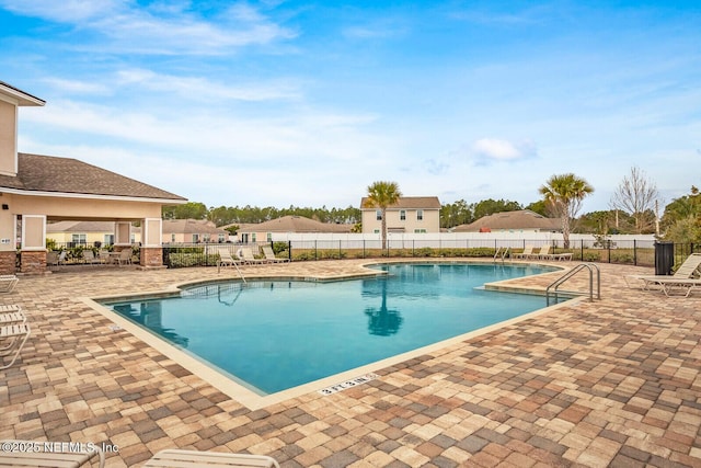 95170 Timberlake Dr, Fernandina Beach, FL 32034 - community pool with fence and a patio