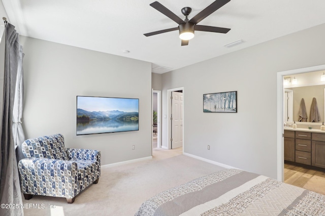 bedroom featuring light colored carpet, visible vents, a ceiling fan, connected bathroom, and baseboards