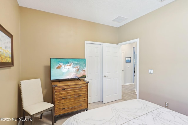 bedroom with visible vents