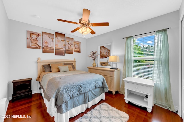 bedroom featuring ceiling fan and wood finished floors