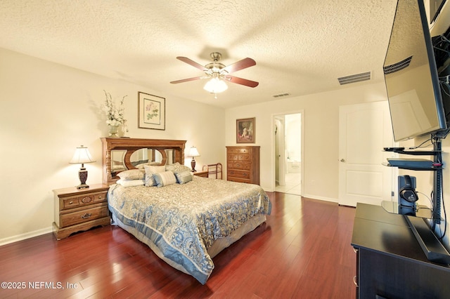 4023 Trail Ridge Rd, Middleburg, FL 32068 - bedroom with baseboards, dark wood-style floors, a textured ceiling, ceiling fan, and ensuite bath