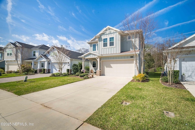 view of front facade featuring a garage, concrete driveway, a residential view, board and batten siding, and a front yard