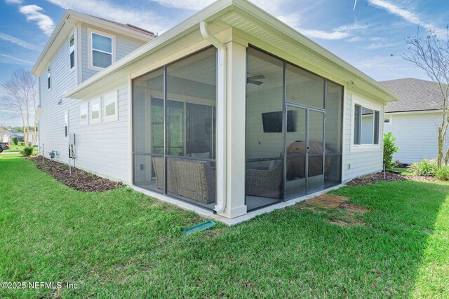 view of home's exterior featuring a lawn