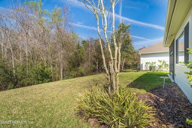 view of yard with fence