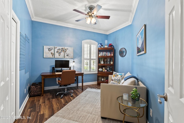 office area with ceiling fan, crown molding, baseboards, and wood finished floors