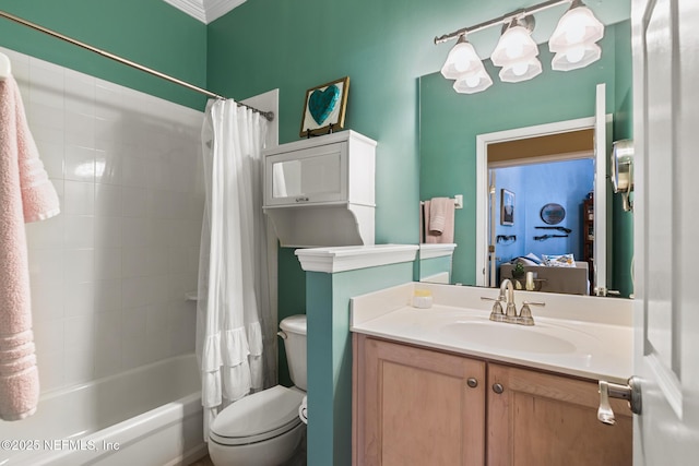 full bath featuring shower / bath combo, vanity, and toilet