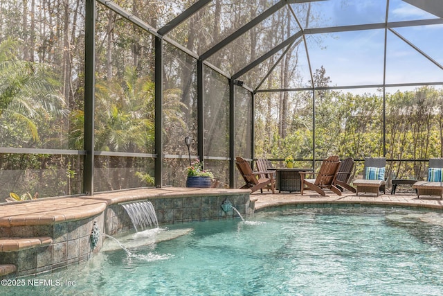 outdoor pool with a patio and a lanai