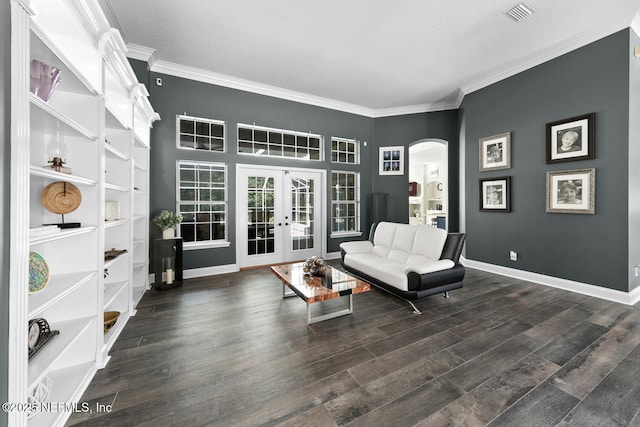 living area featuring baseboards, visible vents, arched walkways, dark wood-style flooring, and french doors