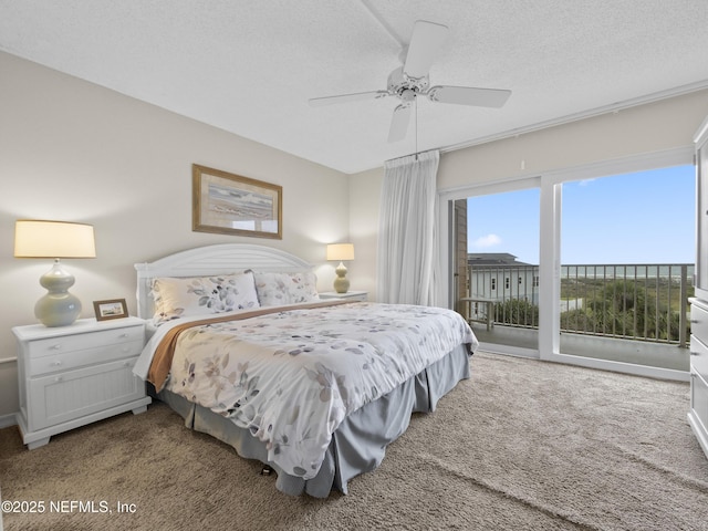 carpeted bedroom featuring a textured ceiling, ceiling fan, and access to outside