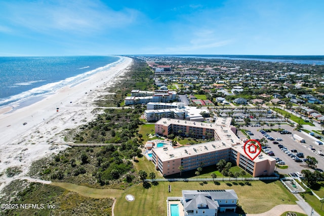 aerial view featuring a water view and a view of the beach