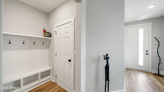 mudroom with wood finished floors