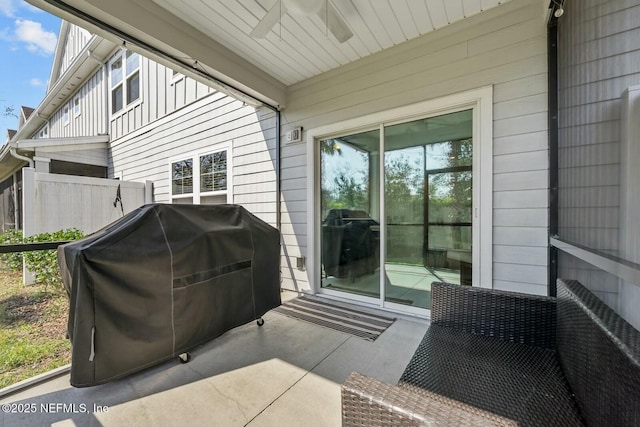 view of patio with grilling area and a ceiling fan