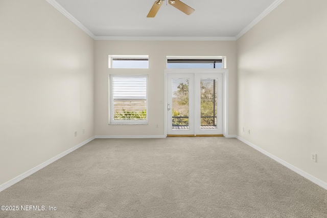 180 Kingston Dr, Saint Augustine, FL 32084 - unfurnished room featuring crown molding, light colored carpet, baseboards, and a ceiling fan