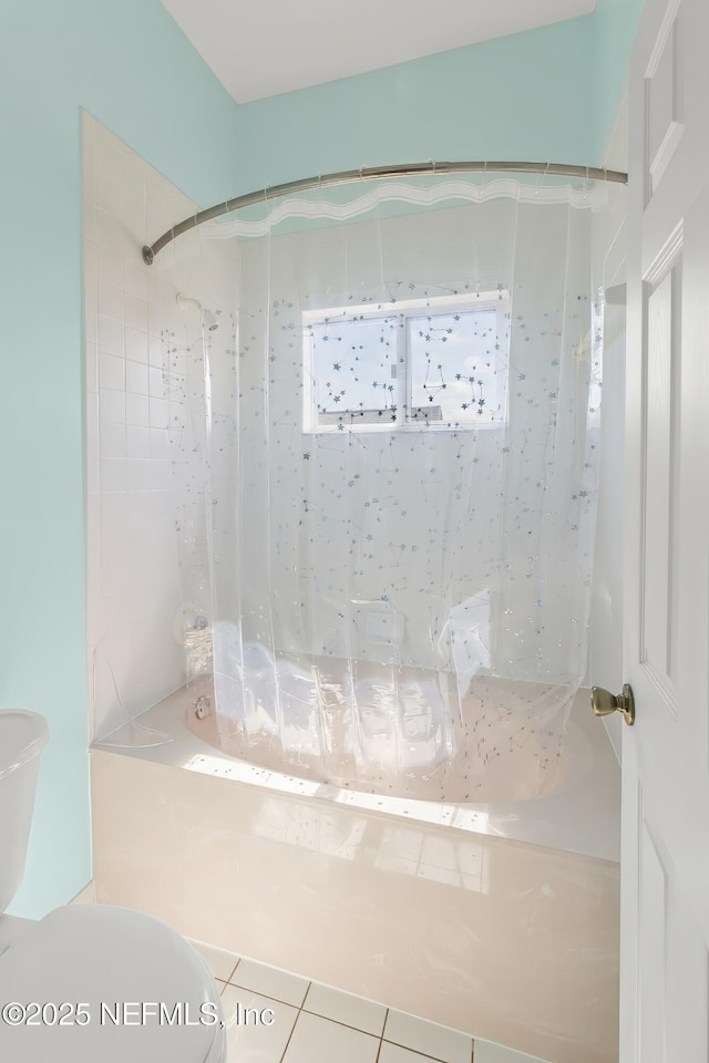 180 Kingston Dr, Saint Augustine, FL 32084 - bathroom featuring tile patterned floors, toilet, and shower / bathtub combination