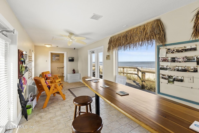 180 Kingston Dr, Saint Augustine, FL 32084 - dining room with a water view, visible vents, and a ceiling fan