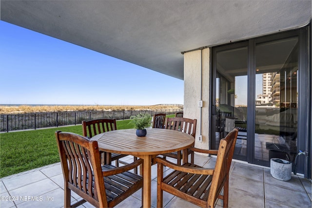 view of patio / terrace with outdoor dining space and a fenced backyard