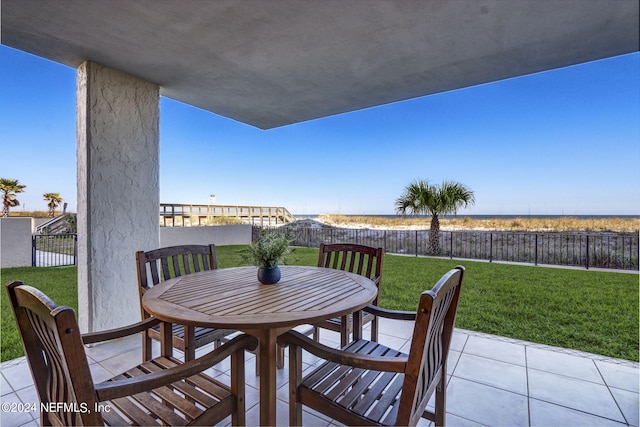 exterior space featuring outdoor dining area and a fenced backyard