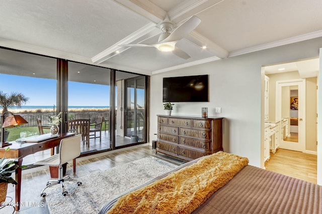 bedroom with light wood-style floors, ornamental molding, expansive windows, access to outside, and beamed ceiling