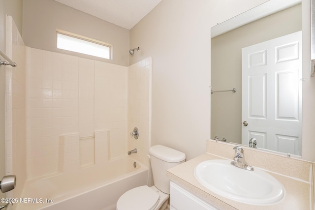 bathroom with toilet, washtub / shower combination, and vanity