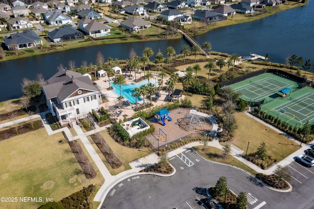 aerial view featuring a water view and a residential view