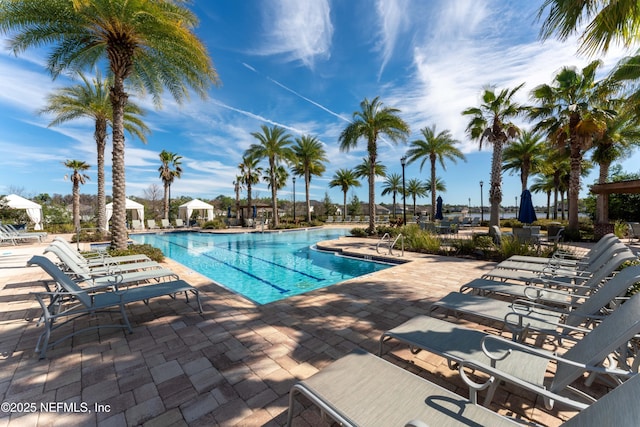 pool with a patio area