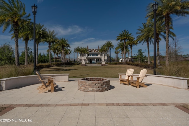 view of patio featuring a fire pit