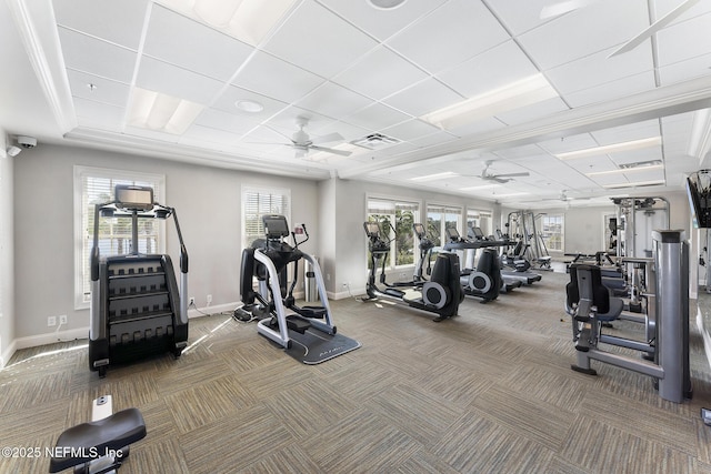 gym with carpet, baseboards, and ceiling fan