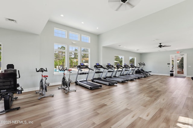 gym with recessed lighting, visible vents, light wood-style floors, ceiling fan, and baseboards