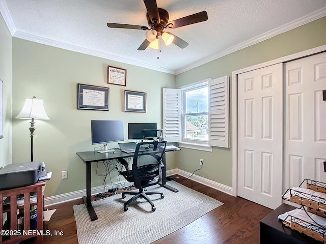 office area with dark wood-style floors, a textured ceiling, baseboards, and crown molding