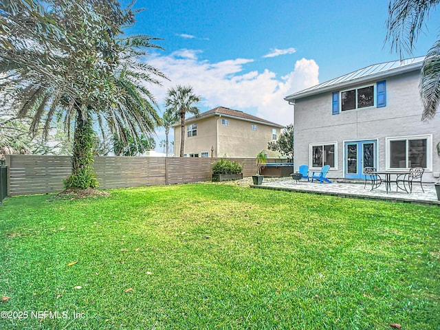 view of yard featuring a patio area and a fenced backyard