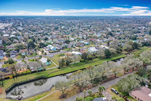 bird's eye view with a water view and a residential view