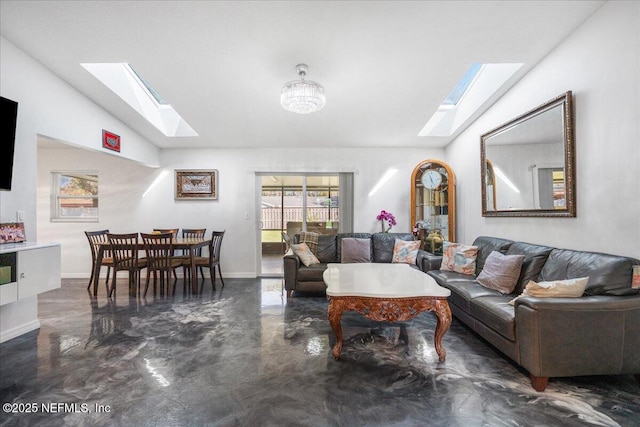 living room with concrete floors, baseboards, and vaulted ceiling