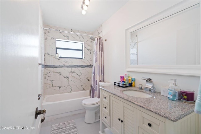 full bathroom featuring shower / tub combo, vanity, and toilet