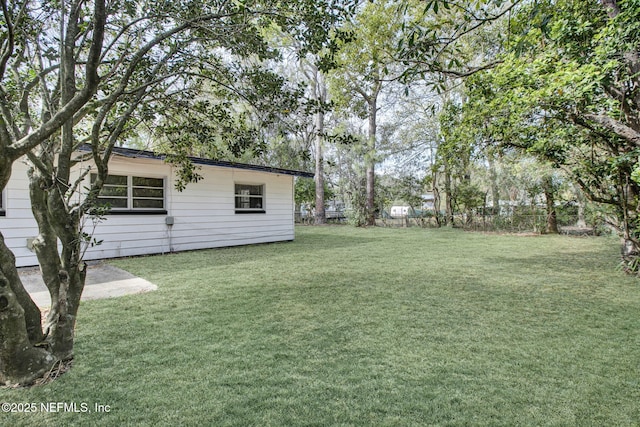 view of yard featuring fence