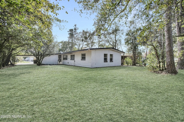 exterior space with a lawn