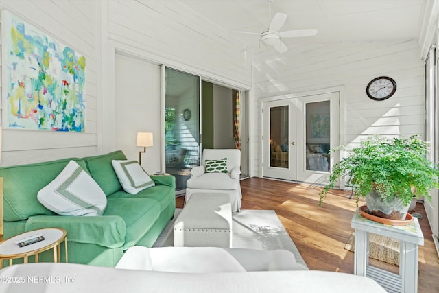 interior space featuring lofted ceiling and ceiling fan